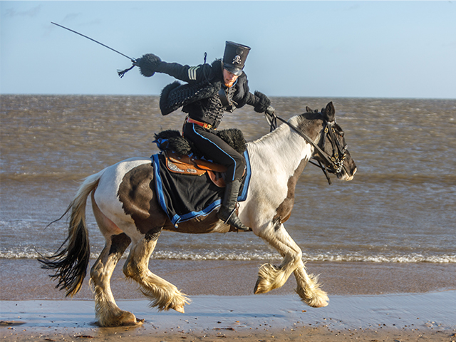 Horses and historic riders photo session on the beach
