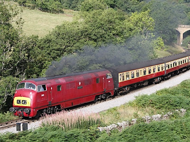 Warship Class 42 'Greyhound' pulling a Mixed Rake of Maroon plus Chocolate Creams on the GCR Mainline