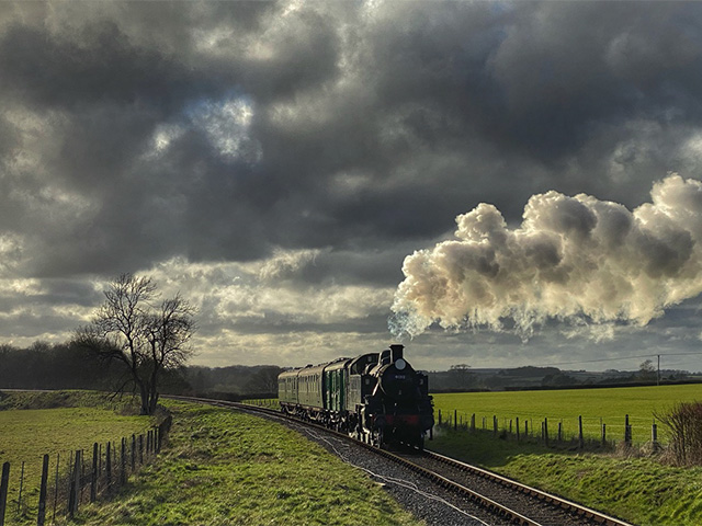 A day of steam photography at the GCR featuring visiting BR 41312 on maroon suburban coaching stock